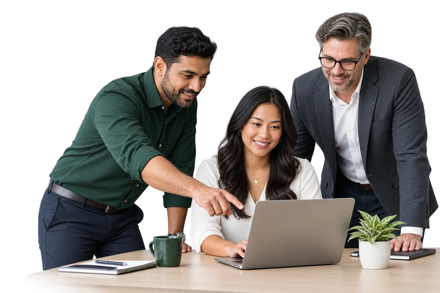 Three colleagues gathered around one laptop; one of them is pointing at something on the screen